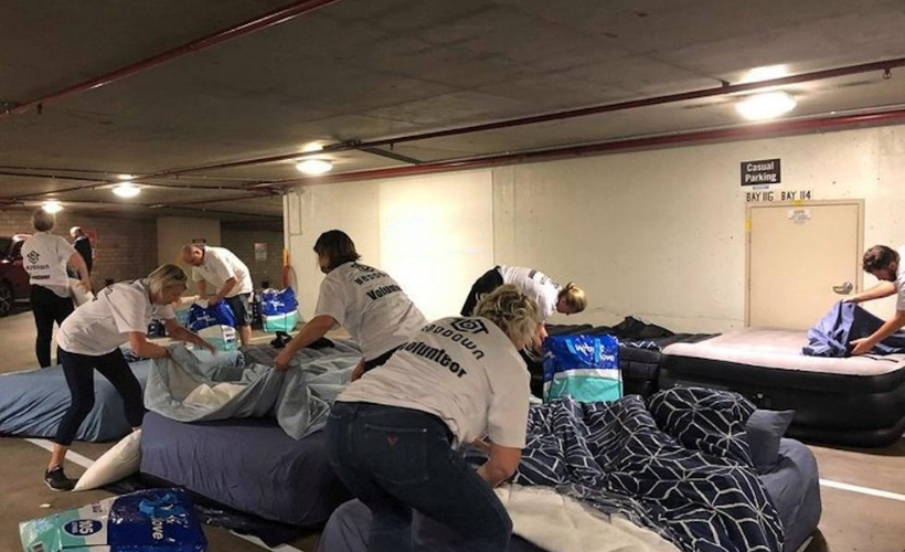Volunteers Convert Parking Lot Into Space for Homeless People to Sleep at Night