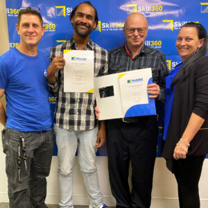 Bedding Down Careers Program Graduates Brian and Daniel smiling with their certificates with Beddown and Busy Ability Team Members