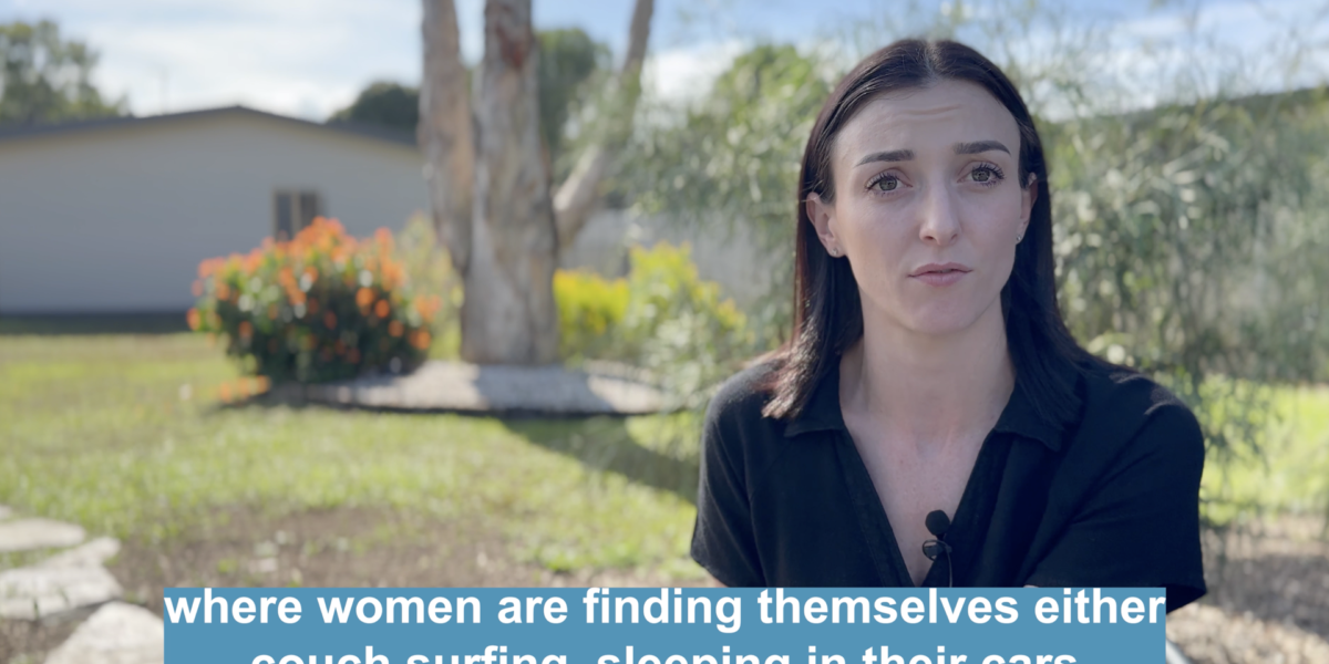 Womens Centre FNQ Programs Manager Brittany Faulkner sitting outside